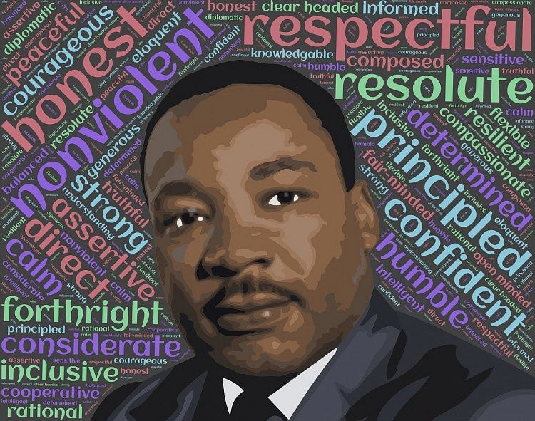 Martin Luther King Jr. with word collage behind him