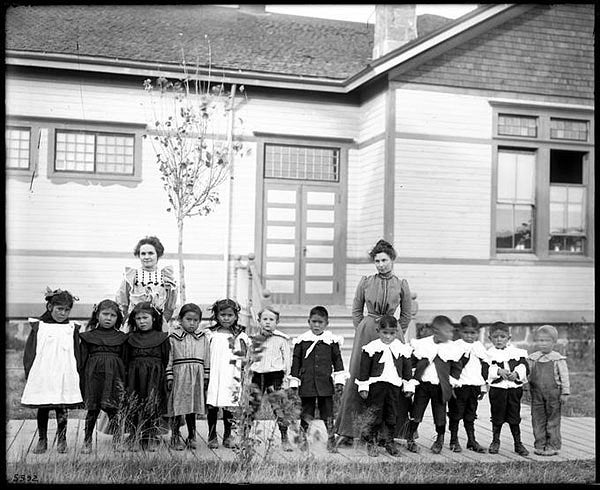 Students and teachers at Warm Springs School, 1901. Reservation schools of this era operated on racist principles aimed at eradicating Indigenous languages and cultures. Courtesy of Oregon Digital.