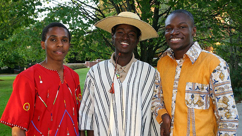 Students wearing culturally diverse formal wear