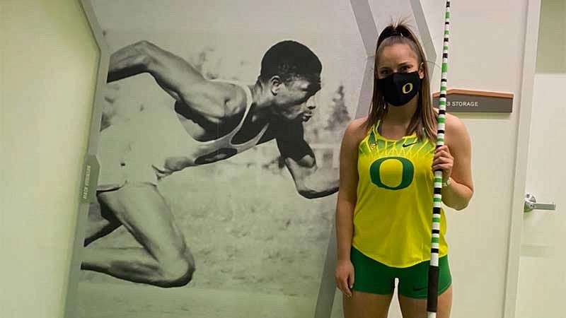 Riley Ovall with her javelin in front of an image of Mack Robinson