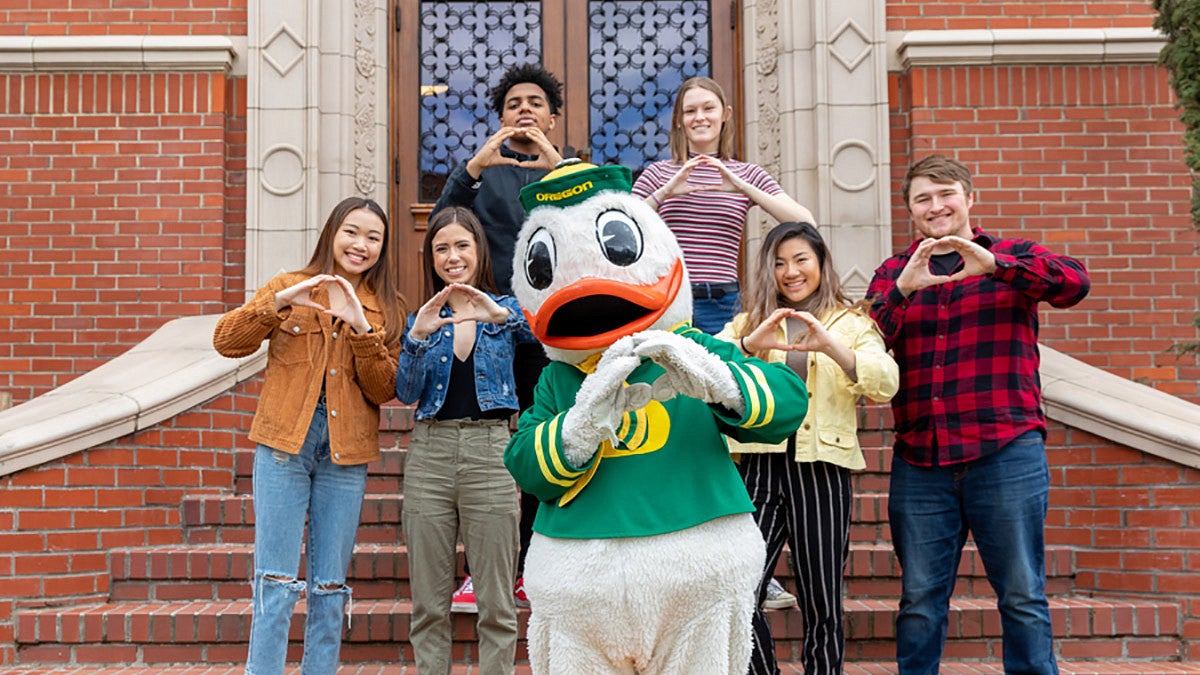 The Duck with students "Throwing the 'O'" on the steps of Chapman Hall