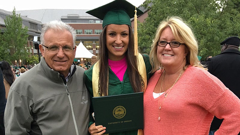 Jenna Prandini with her parents at graduation