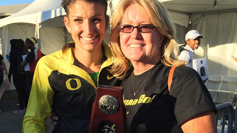 Jenna Prandini and her mom holding her NCAA runner-up trophy for the long jump
