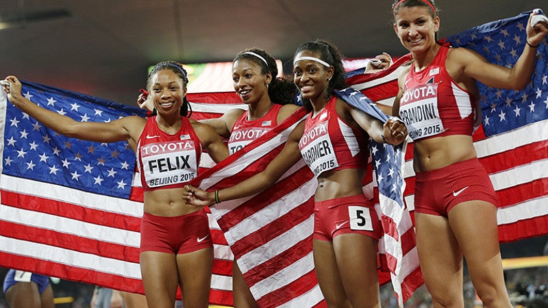 Jenna Prandini celebrates with teammates Allyson Felix, Jasmine Todd, and English Gardner after finishing second in the women’s 4x100-meter relay final at the 2015 World Championships in Beijing.
