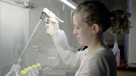 Jennifer Hampton Hill working in the lab