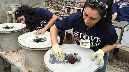UO students sanding stoves during Alt Break in Guatemala