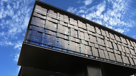 Staggered panes of tinted glass act as "sunglasses" on the building's west façade, cutting solar glare and heat. Photograph courtesy ZGF Architects