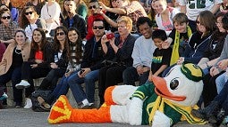 The Duck posing for photos with alums