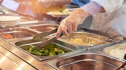 Food being served from steam trays