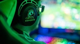 Esports player with Duck on headphones