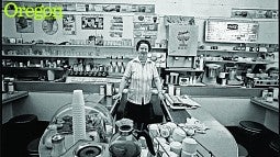 Mary Louise Pope stands at the counter of her popular ice cream and donut shop shortly before relocating her business to the suburbs. Photograph by John Bauguess