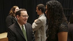 President Michael Schill with students