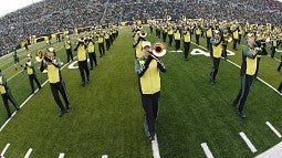 The UO Marching Band performing at Autzen Stadium