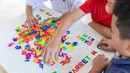 Children working with letters