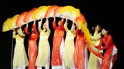 A Chinese fan dance is an example of the kinds of entertainment at the annual Asian Celebration