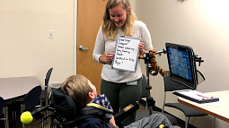 Audiologist working with a student