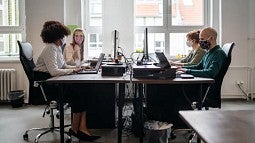 Office workers at computers