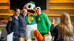 The Duck posing with parents