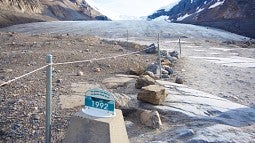 Shrinking glacier with markers