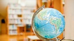 A globe in a classroom