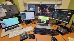 Computer screens showing actors
