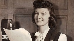 Peg Lynch with script and radio microphone.