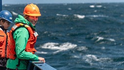 Biologist Kelly Sutherland on research vessel