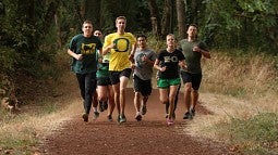 Runners on a trail near campus
