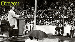 Gus Hall, leader of the Communist Party USA, speaking at Hayward Field in 1962. Photograph courtesy UO Libraries Special Collections and University Archives
