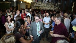 UO president Michael Schill visits with faculty, staff and students at a reception on Monday, July 6, at Allen Hall