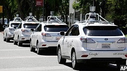 Google's self-driving cars lined up ready to go