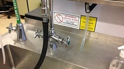 Sink with warning sticker