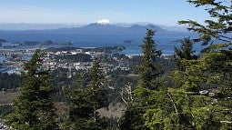 View looking over Sitka, Alaska, and Mt. Edgecumbe from the Mount Verstovia trail