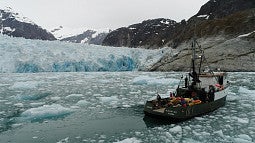 Researchers in front of Alaska’s LeConte Glacier