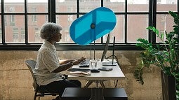 Woman at desk using TaskShade