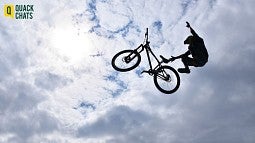 Teen doing bike acrobatics
