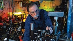 David Wineland working in a lab