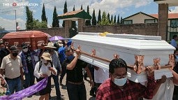 Funeral for a Mexican woman and her daughter