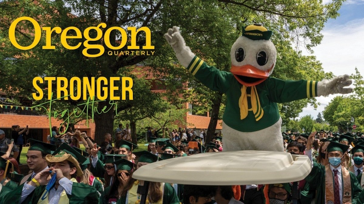 Oregon Quarterly Summer 2021 cover shows the Duck and graduates (credit: Chris Larsen, University Communications)