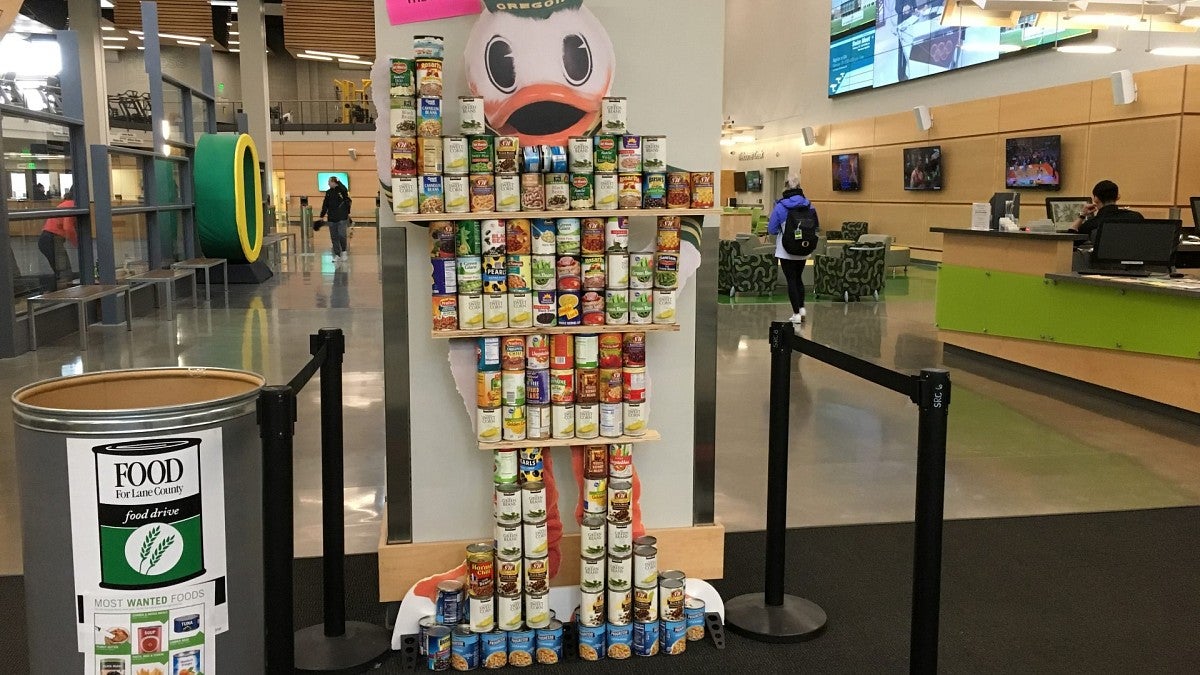 A duck sculpture made from canned food