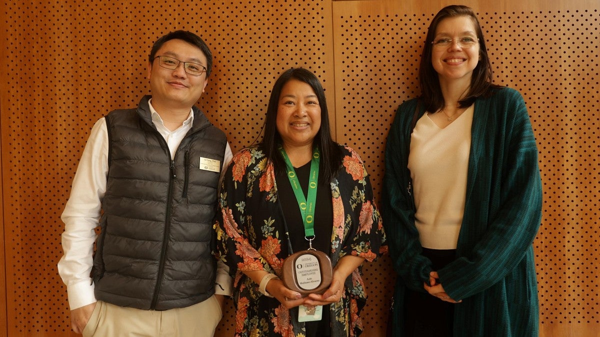 Outstanding Employee Award winner Azle Malinao-Alvarez with her colleagues Le Yang and Alicia Salaz from UO Libraries