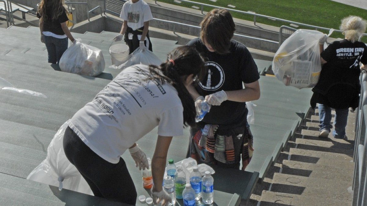 Volunteer cleanup is a big part of the post-game scene at Autzen Stadium
