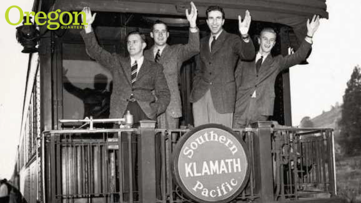 Four members of the 1938-39 University of Oregon basketball team, known as the Tall Firs, waving from the rear platform of a train as they depart Eugene for the 1939 NCAA basketball tournament's West regional held in San Francisco.