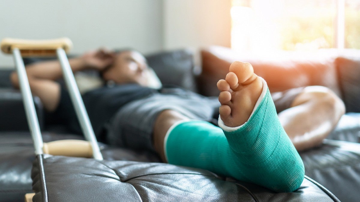 Man with foot in cast