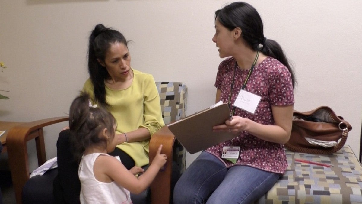Interviewing a mother in the dual language lab