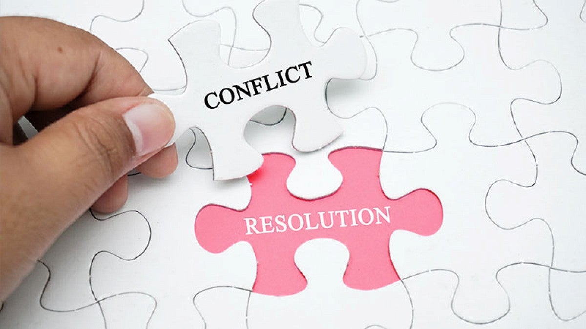 Puzzle pieces with words conflict resolution