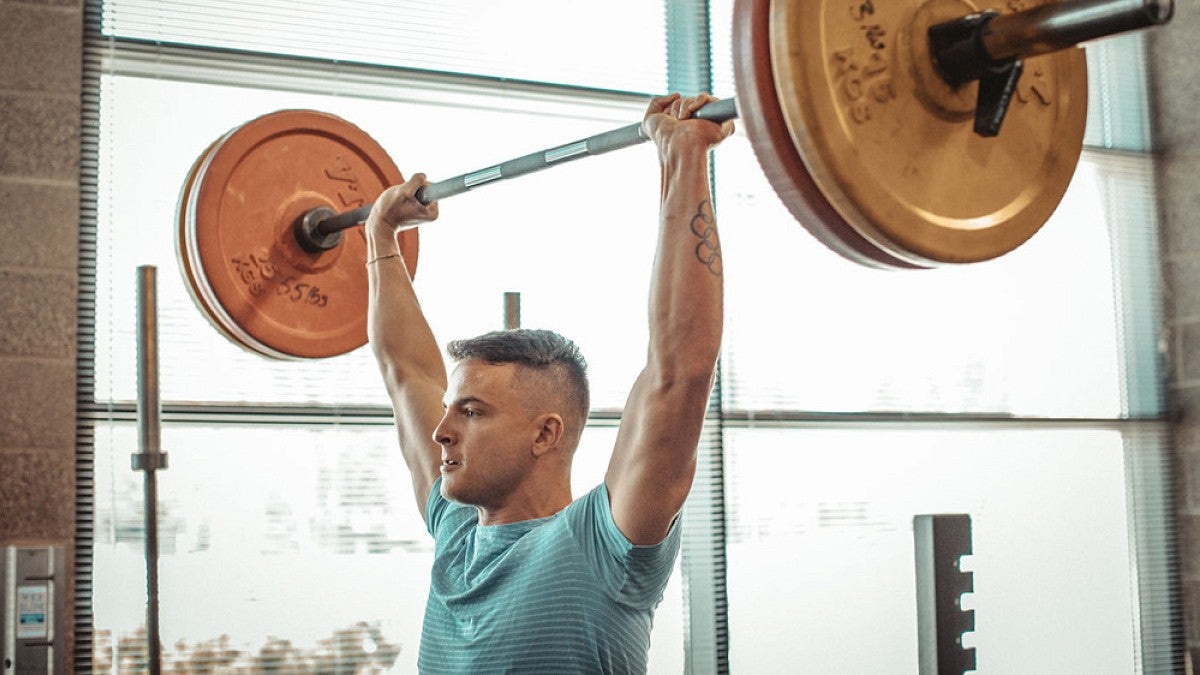 Devon Allen lifting weights