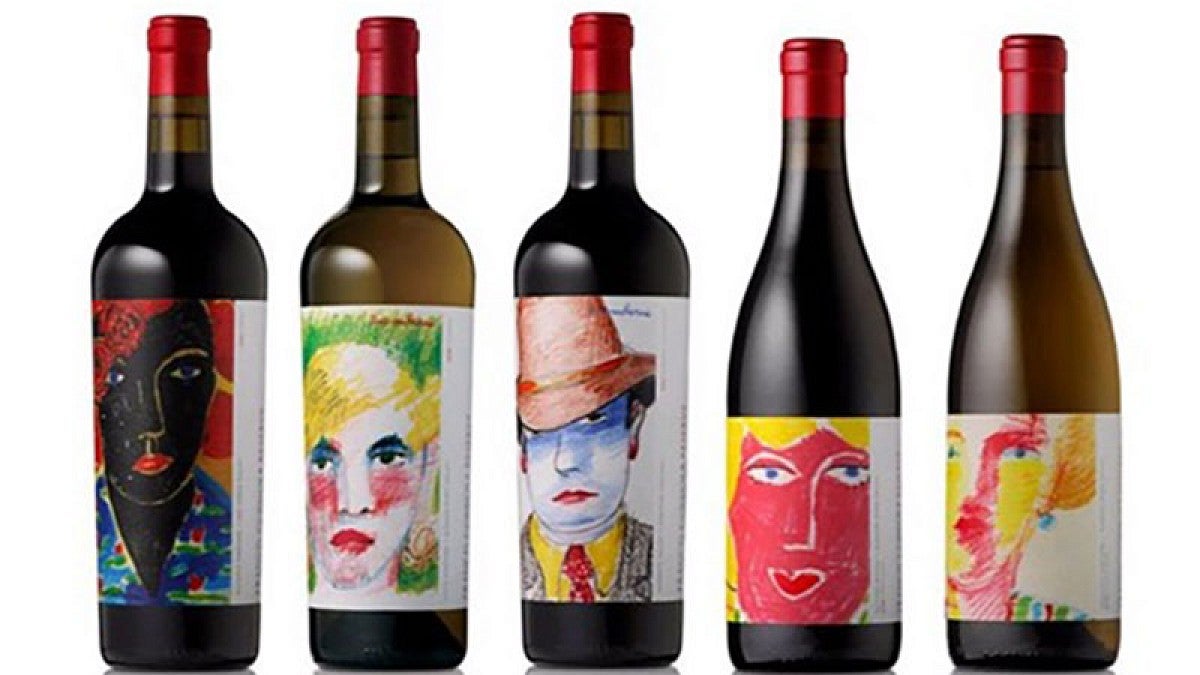 Wine bottles with faces on labels