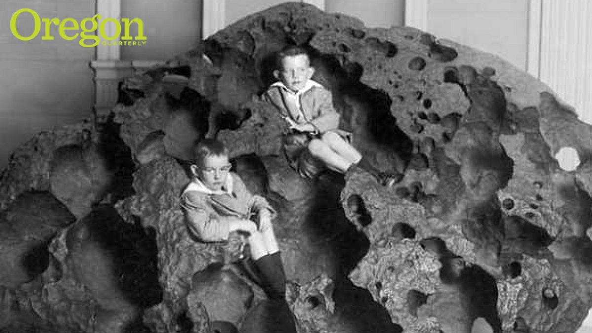Two boys sitting inside the Willamette meteorite at the American Museum of Natural History in New York City, 1911. Photo courtesy American Museum of Natural History/New York Times