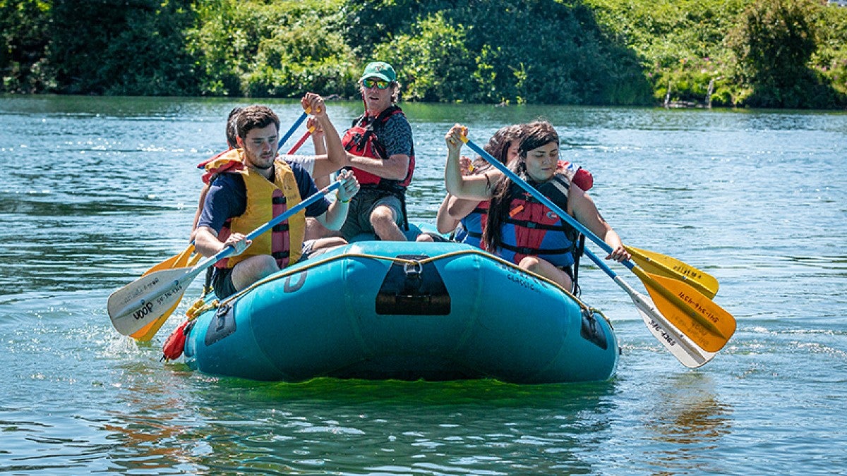 Group of IPCA participants on a raft